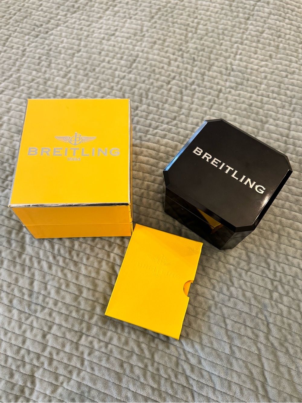 Breitling Bently Motors Black wood case & yellow box. All original and authentic